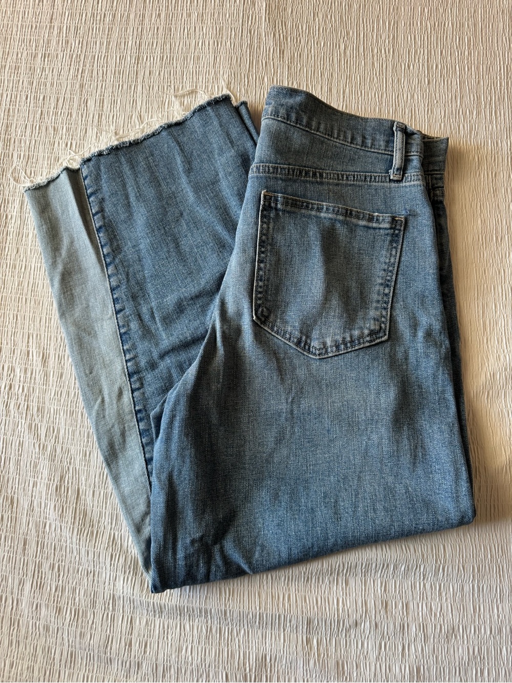 GAP High-Rise Wide-Leg Two-Tone Jeans with a distinctive raw hem size 8